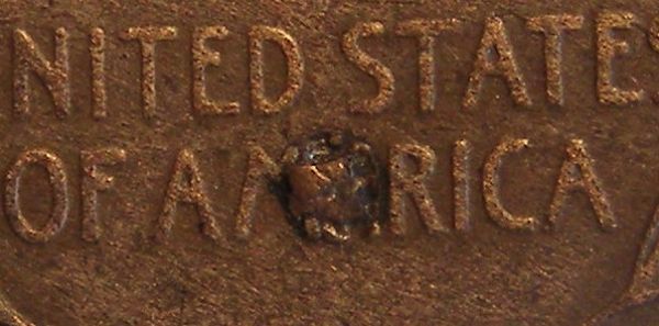 Odd-Damage-On-A-1909-S-VDB-Penny